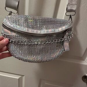 Brand new Fanny pack !!! 
Silver and shinny.